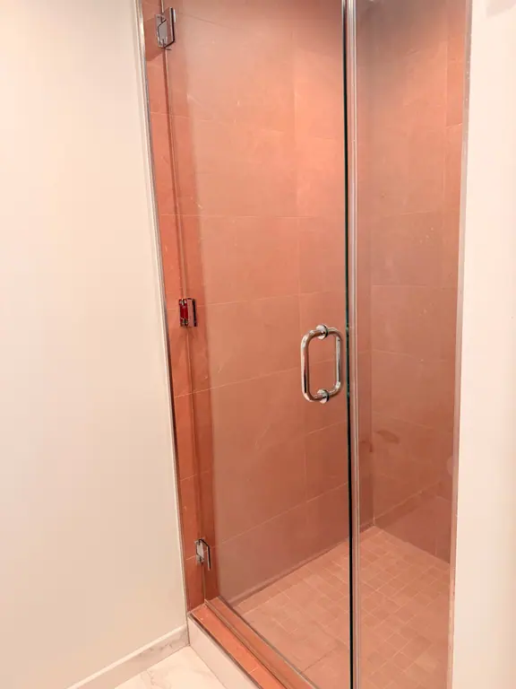 Glass shower detail by Canes Cleaners